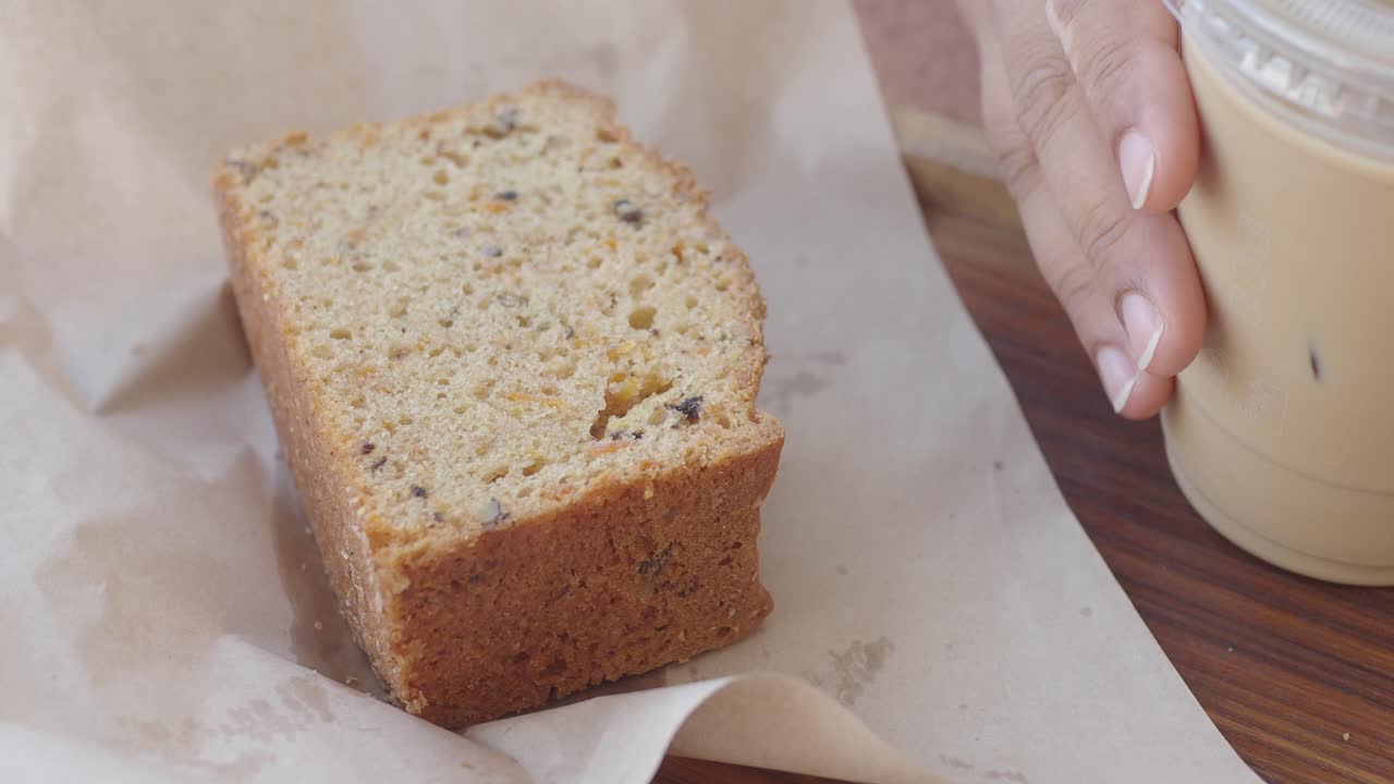 Iced coffee and a slice of carrot cake