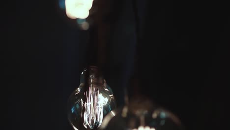 Set-of-beautiful-low-luminous-lamps-in-a-dark-room-close-up
