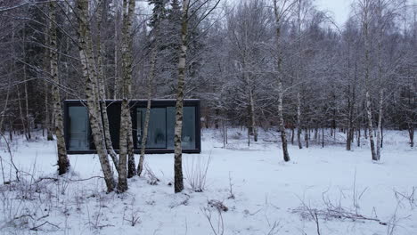 modern mishkan conteren located in the middle of the forest