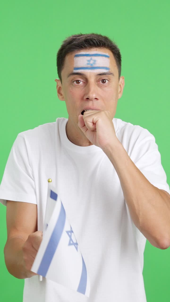 Man cheering for Israel during a match that is lost