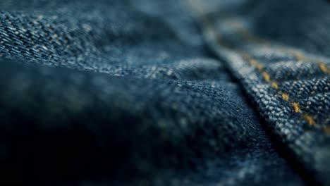 blue textile jeans cloth texture close-up macro. fashion fabric multicolor. cotton casual clothes