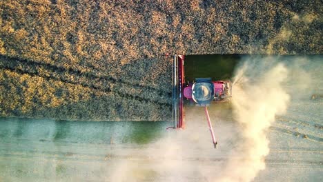 birds eye view drone shot combine harvester on farm in shropshire