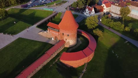 Aerial-footage-of-Kaunas-castle,-situated-in-Kaunas-old-town,-Lithuania-in-beautiful-sunny-evening