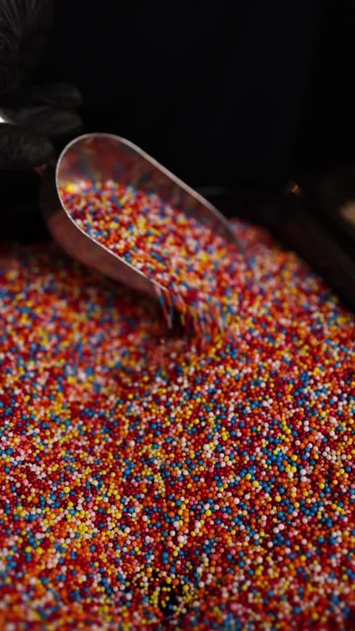 Colorful Sprinkles Being Scooped