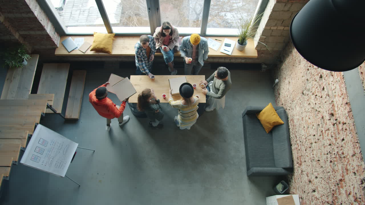 Team Lunch Meeting in Modern Office