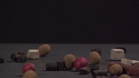 candy falling at black background in 500fps