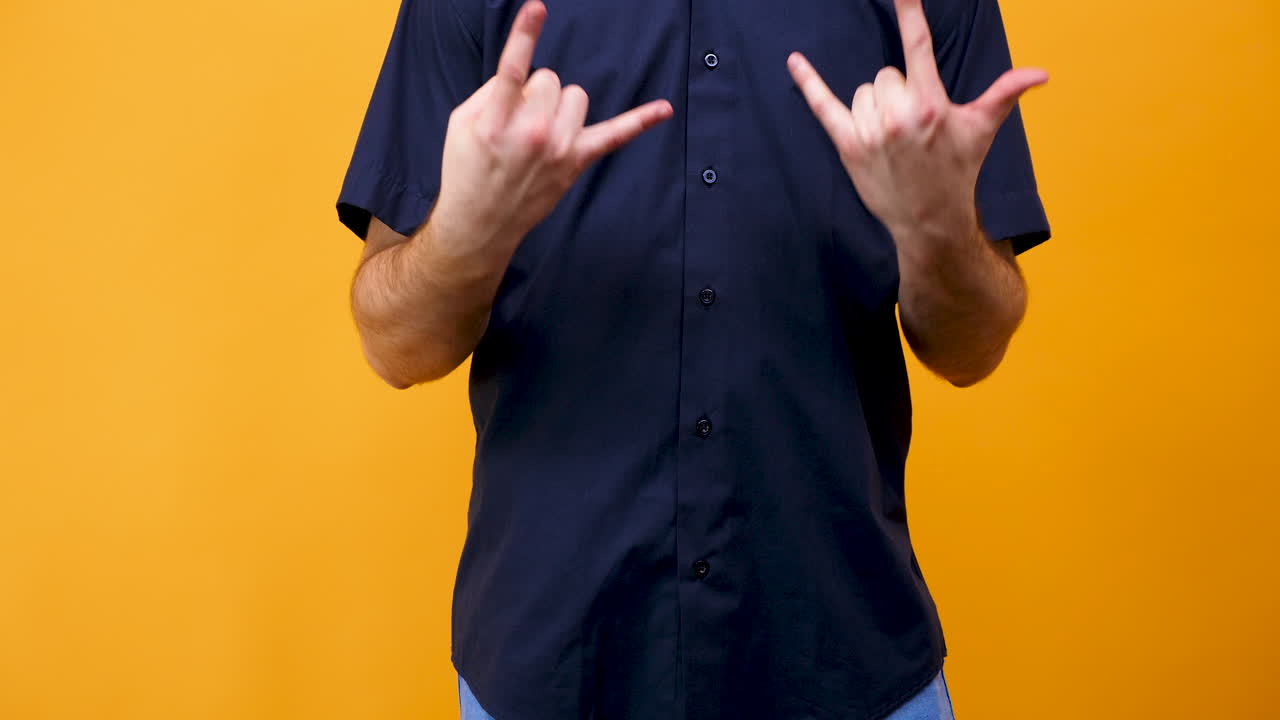 Hand gestures on orange background