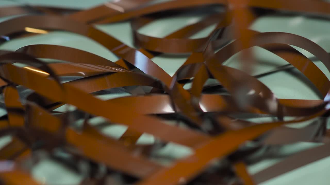 Tape Unreel. Pulling the tape out. Destroying cassette tape media. Scene F