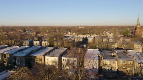 low angle aerial shot of urban houses in low income neighborhood