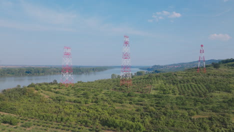 river landscape with communication towers