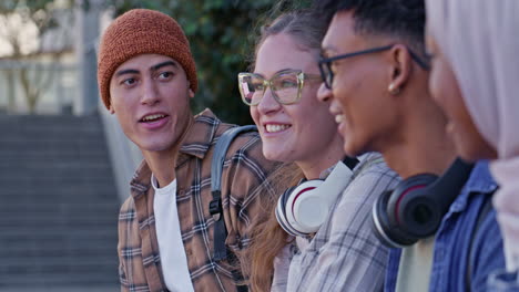 group of diverse students in conversation on campus