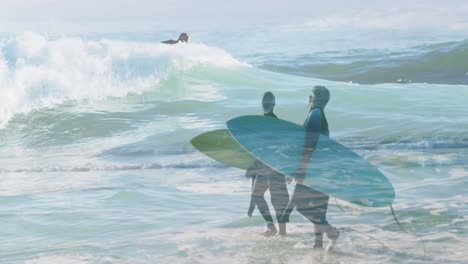 animation of man surfing over diverse senior couple walking on beach with surfing board