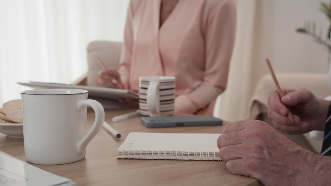 Businesspeople Meeting at Office to Discuss Deal