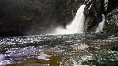 linville falls water splashes in foreground light snow