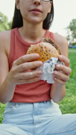 woman eating a burger