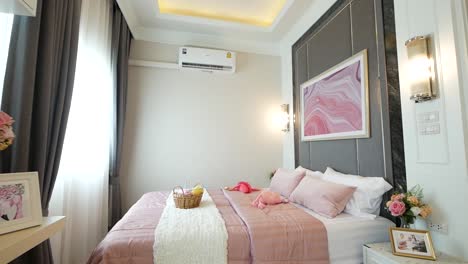 pink tone color bedroom decoration walk-through with good natural lighting