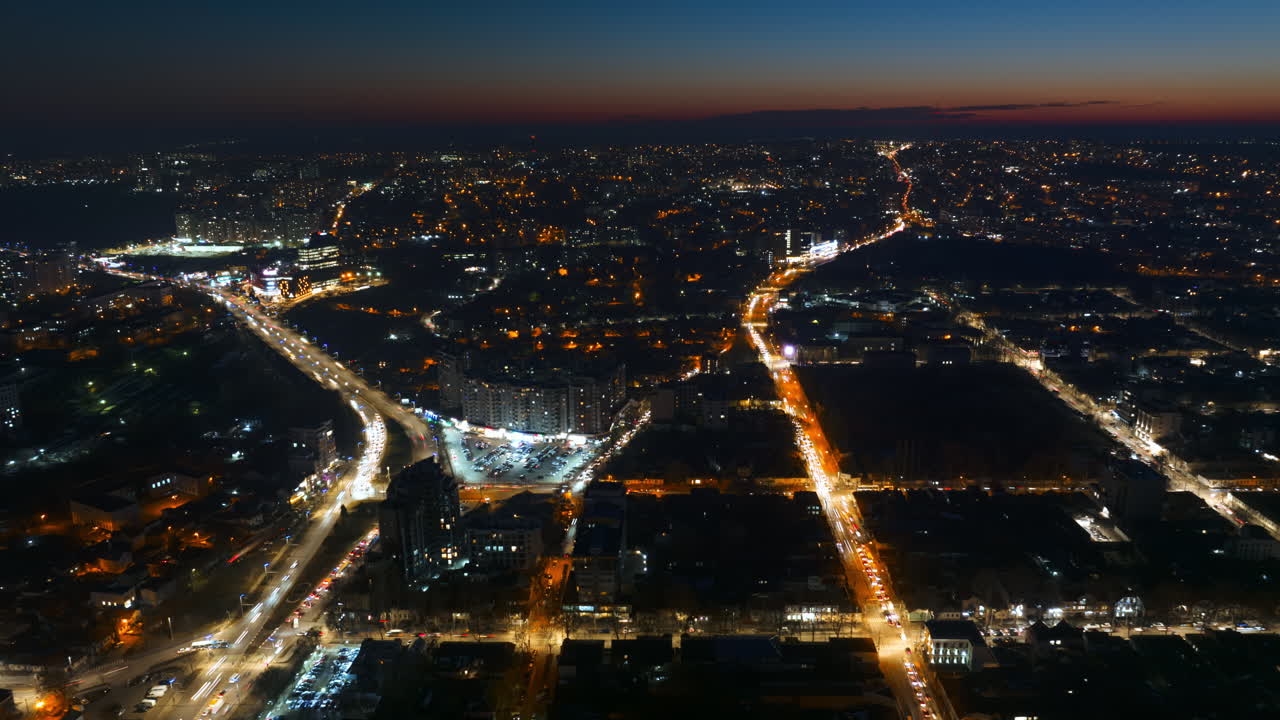 Aerial drone hyperlapse timelapse of Chisinau city at sunset. Blue hour. Moldova
