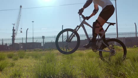 active man riding dirt bike