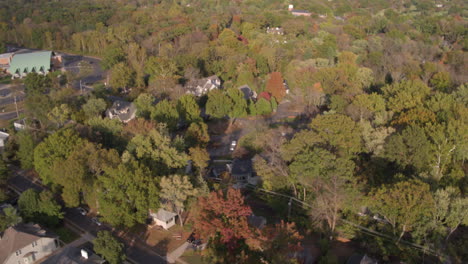 flyover trees and houses in ladue missouri on a pretty fall day