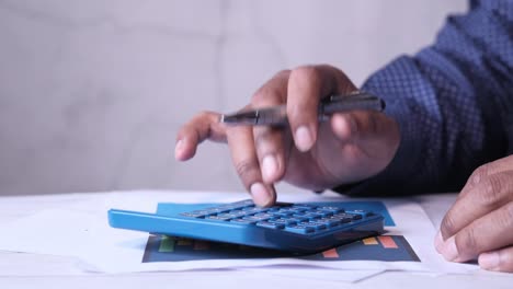 person using a calculator