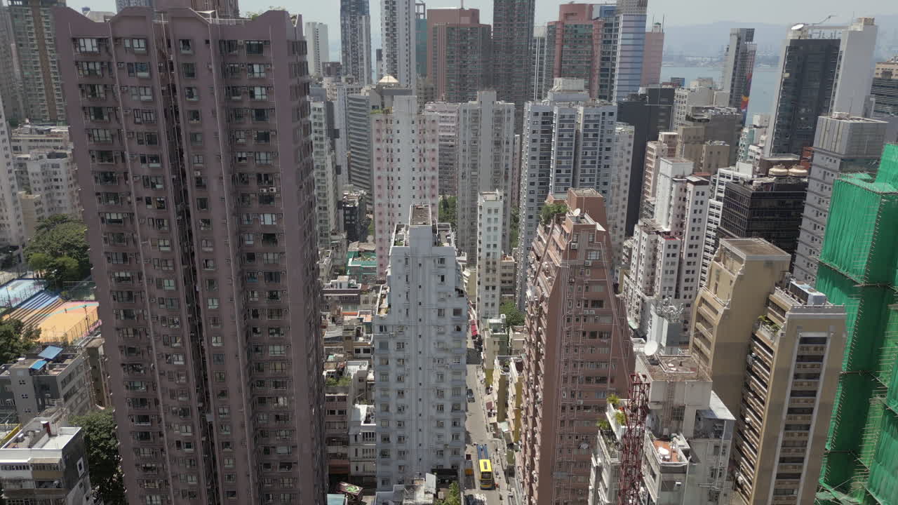 Iconic Hong Kong Apartment Buildings From Above China Drone Pull Back 4K 60FPS