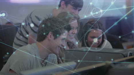 animation of network of connections over group of students using computer and smiling at college