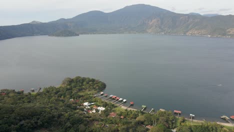 coatepeque caldera lake in el salvador with surrounding hills, aerial view