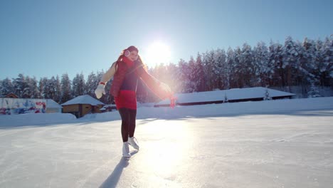 woman ice skating on a frozen lake in winter