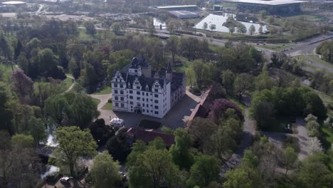 medium aerial view of wolfsburg castle in germany