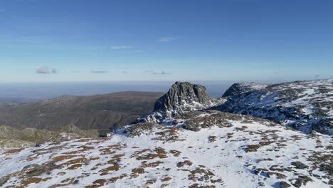 flying over the mountains in the winter