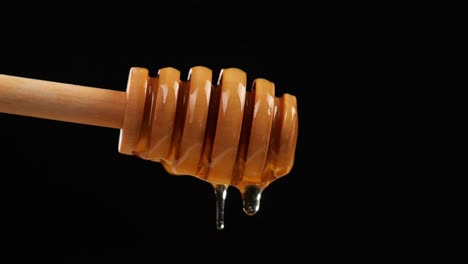 honey dipper with dripping honey