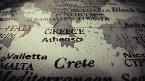 close-up of a world map, focusing on greece and italy