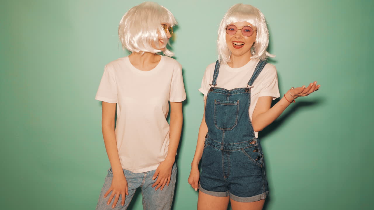 Two Happy Girls with Money