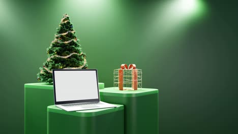 Laptop,-Weihnachtsbaum-Und-Verpacktes-Geschenk-Auf-Grünem-Hintergrund