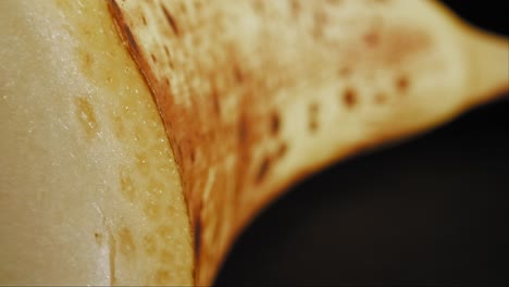 cinematic pan across ripe banana's fleshy interior