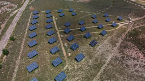 solar panels in a large solar farm in zaragoza, spain, aerial view