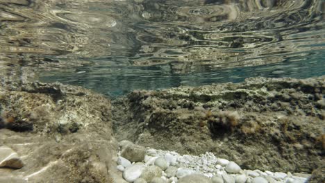 crystal clear water of the beach with sunlight reflection