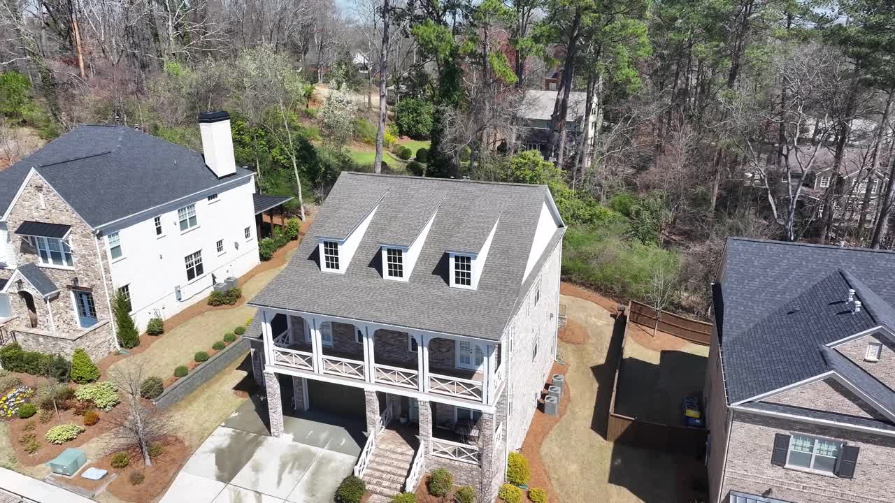 Aerial of Atlanta luxury condominium complex neighbourhood, residential houses in sunny daylight with trees and gardens, Georgia, Aerial