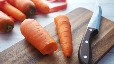 cut carrots on wooden cutting board