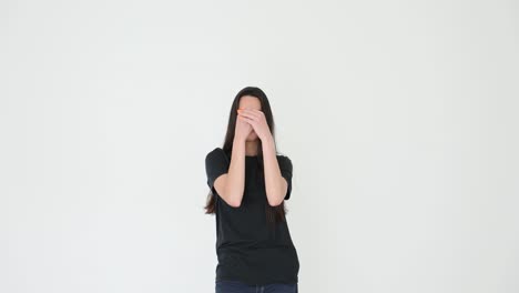 young woman posing and gesturing on a white background