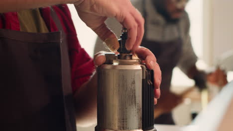 engineer in woodworking studio fixing defective wood shaper