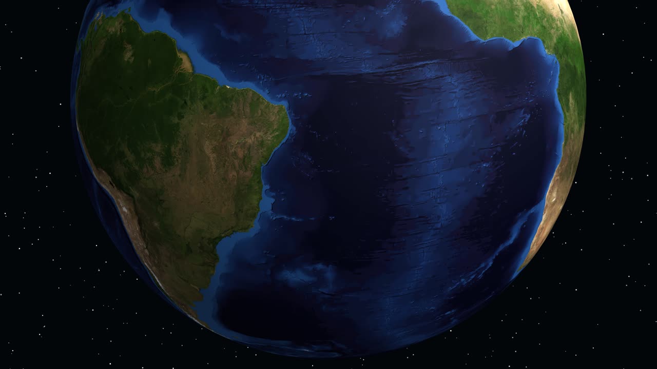 Il globo digitale ruota e zooma sul Sud America, evidenziando Ouro Preto con sovrapposizioni di testo informativo