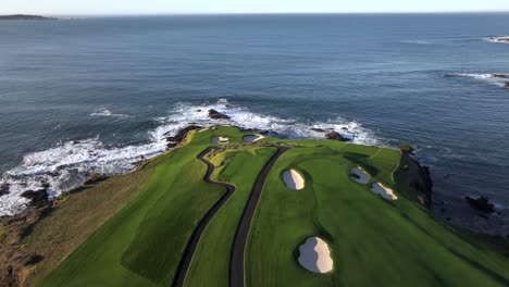 pebble beach golf course 6th and 7th holes - flying like a golf ball over the fairway into the ocean, aerial fly over