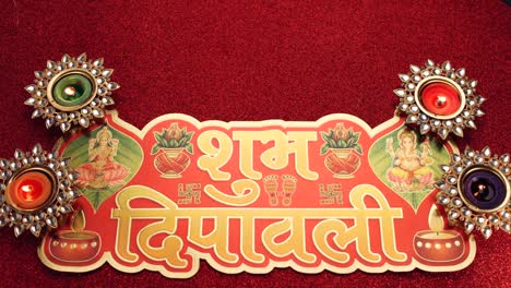 2020-diwali diyasflames van de la mano con las máscaras faciales