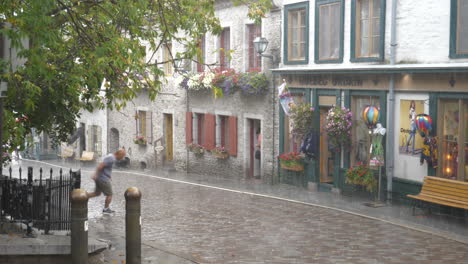 torrential rain downpour in quebec city old town