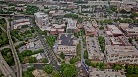 Atlanta-Georgia-Aerial-v875-hyperlapse-birds-eye-view-capturing-busy-interstate-freeway-traffics-at-Capital-Gateway,-tilt-up-reveals-South-downtown-cityscape---Shot-with-Mavic-3-Pro-Cine---May-2023