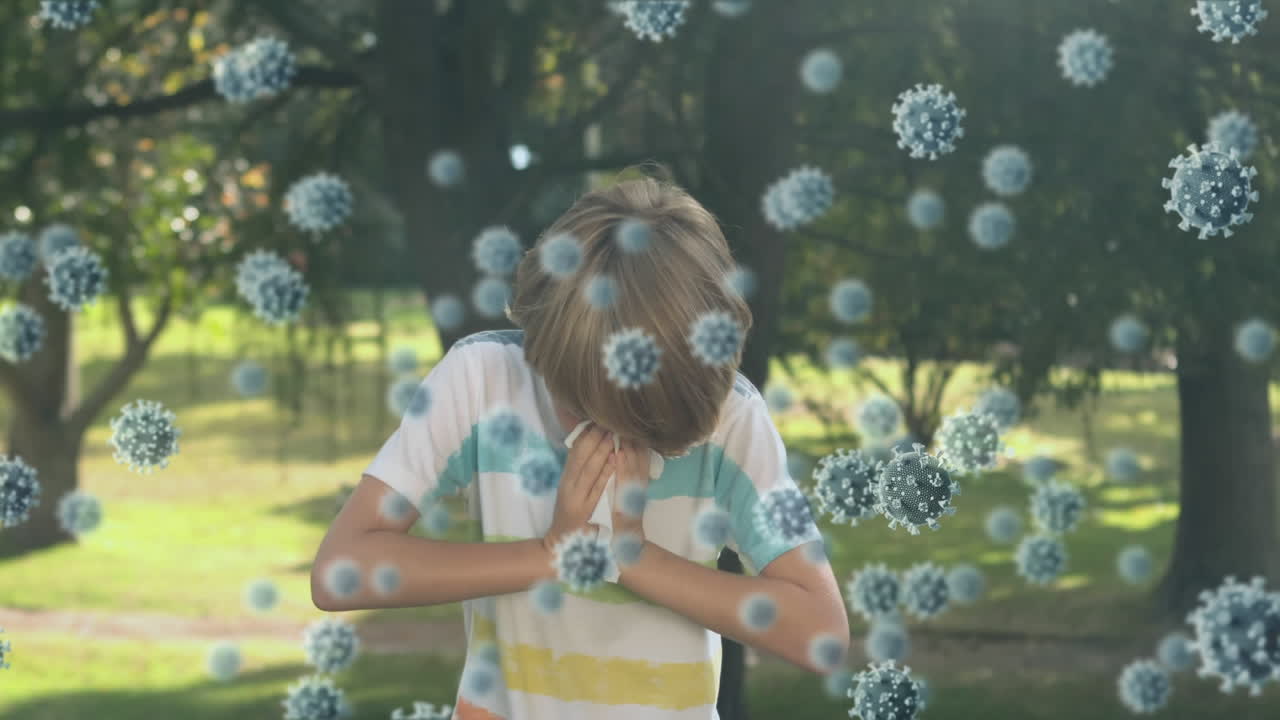 animación de células macro covid-19 flotando sobre un niño caucásico estornudando