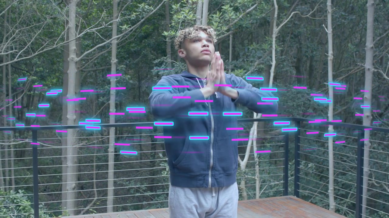Man initiating stretch on deck moving arms joining palms for health magenta-cyan streak hiding view