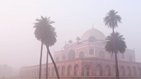 humayun tomb at misty morning from unique perspective shot is taken at delhi india