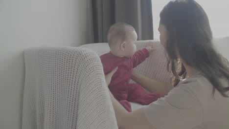 Mom-And-Cute-Baby-At-Home-Close-Up